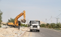 گزارش تصویری / ادامه عملیات بهسازی ورودی بوستان ملت (پارک شهر) لار